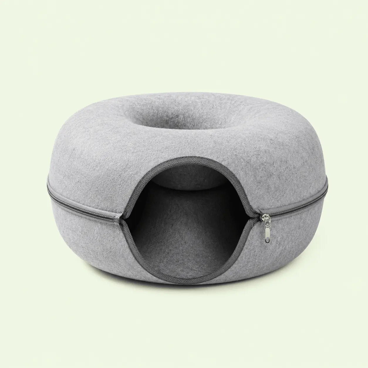 Lit-tunnel donut pour chat en feutre gris clair avec fermeture éclair, vue de face
