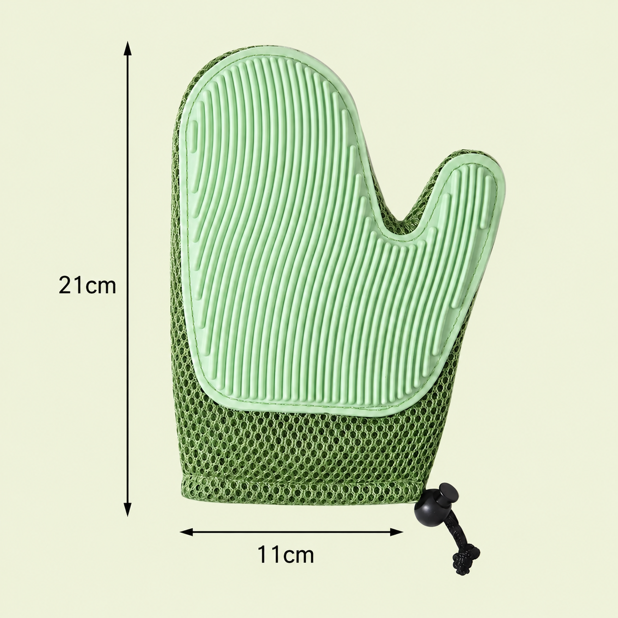 Gant de toilettage pour chat vert clair avec dimensions 21 x 11 cm