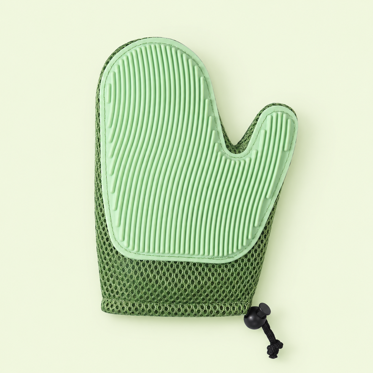 Gant de toilettage pour chat coloris vert clair, face à têtes souples