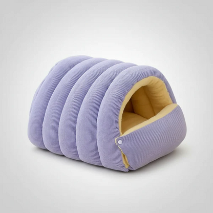 Lit grotte douillet pour chat avec chat installé à l'intérieur