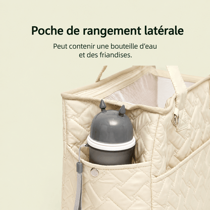 Poche latérale du sac de transport pour chat contenant une gourde et des friandises